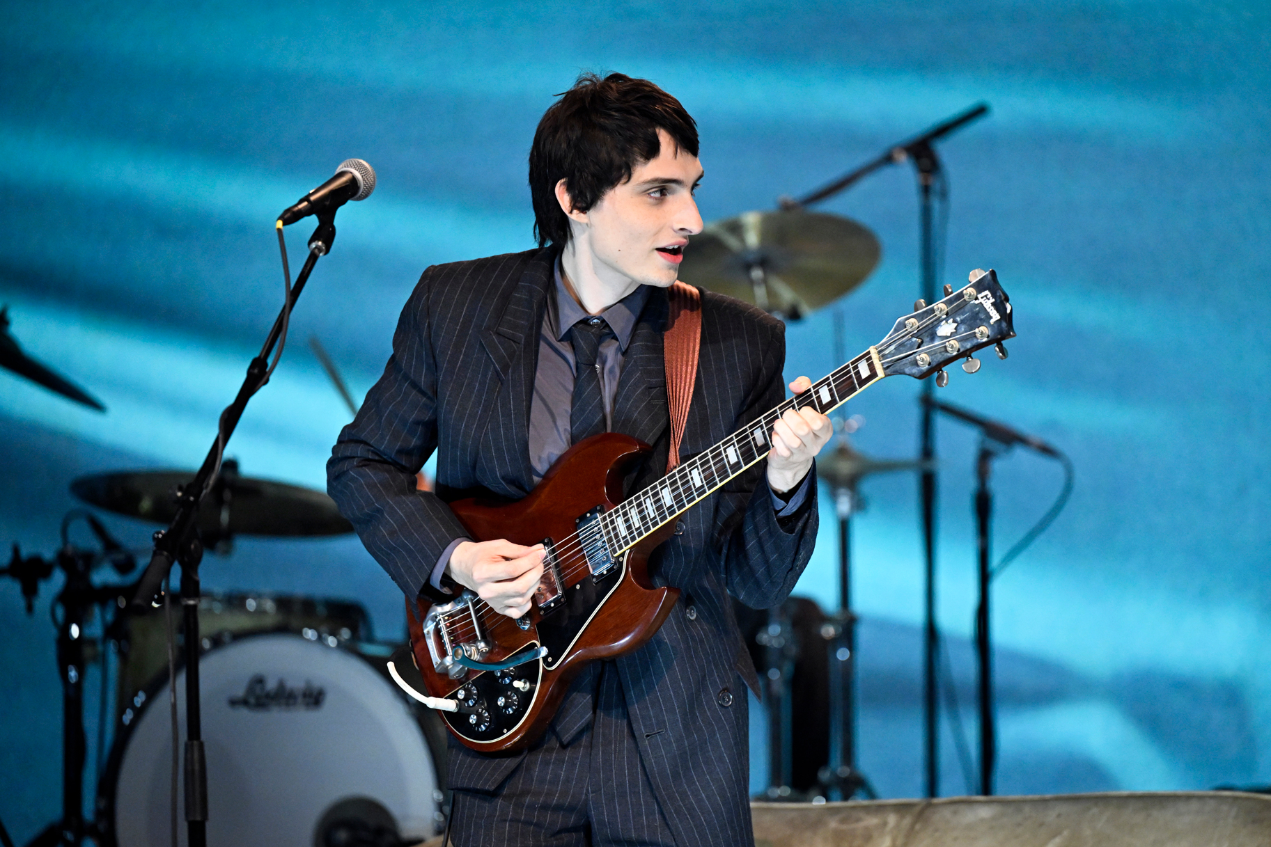 Finn Wolfhard performing on tour